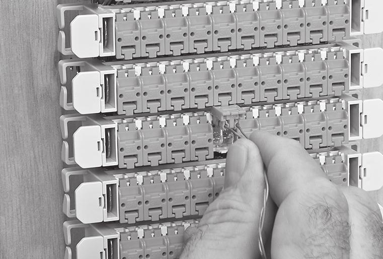 11 Terminate all 10 conductors in each block at the top metal tab. This ensures adequate conductor slack for each block. 6.