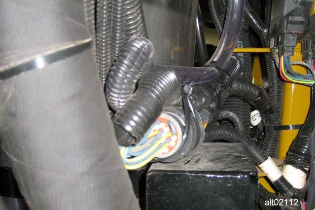 12. Locate the RoGator Boom Valve 31-pin connector at the rear of the sprayer. Twist the locking ring and disconnect the boom cable. Boom Valve Connection 13.