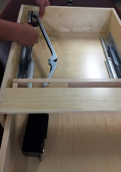 Extend the Docking Drawer outlet and insert the left