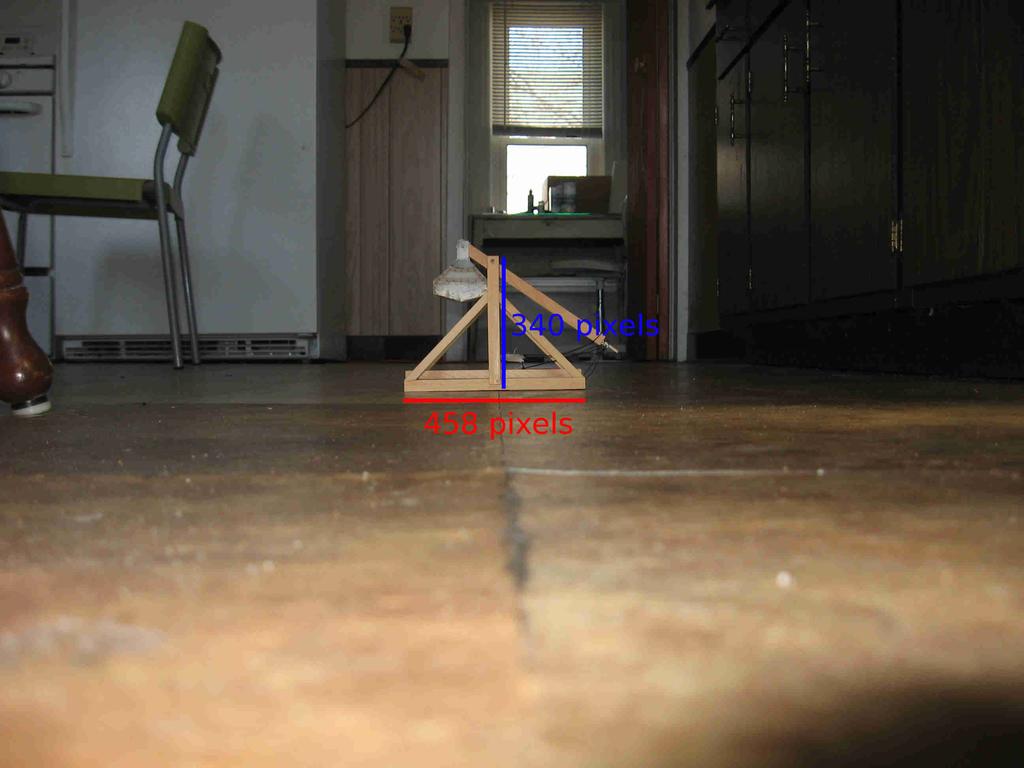 Figure 2: Model trebuchet is ready for battle 1.2 Triangulation and Coordinate Transformations The position of the camera can be found by measuring the angles between landmarks with known positions.