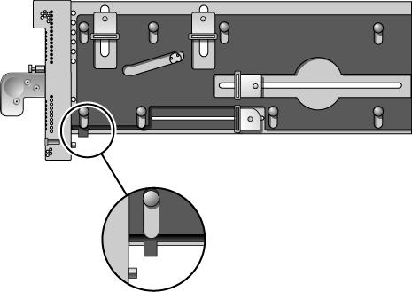 FIGURE 3-17 Locator Bar on Carrier (Carrier Handle Shown in the Closed Position) 12. Carefully place the carrier in the card guides at the top and bottom of the carrier slot in the I/O boat. 13.