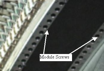 6. Completely loosen the digital cable thumb screws until they pull back freely from the backplane. Do NOT release the wedge clamp yet. See Illustration 12.