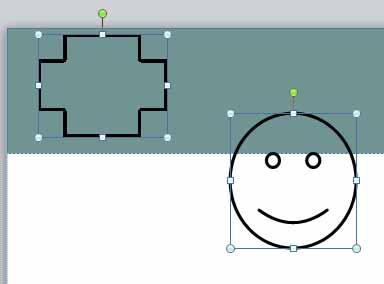 For this example use the smilely face shape as illustrated. You need to select the shapes you want to group. Hold down the Shift key and click on the cross and the smiley face.