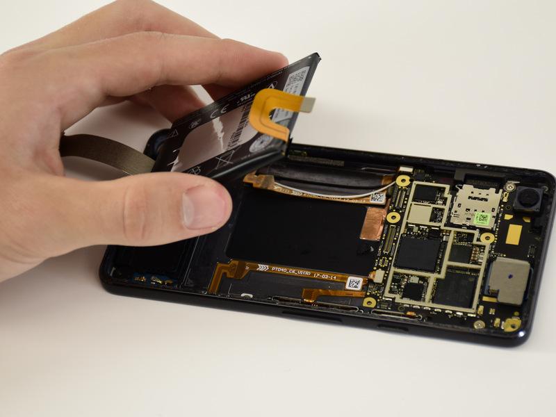 To install a new battery: Remove any remaining adhesive from the phone, and clean the glued areas with isopropyl alcohol and a lint-free cloth.