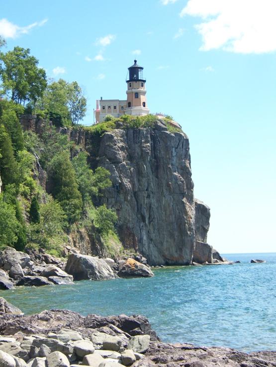The lighthouse is 16 m tall and sits atop a cliff that is 40 m.