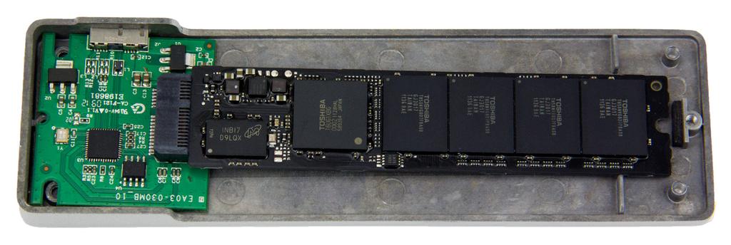 3. Insert the Apple SSD into the black SATA connector on the circuit board, as shown below.