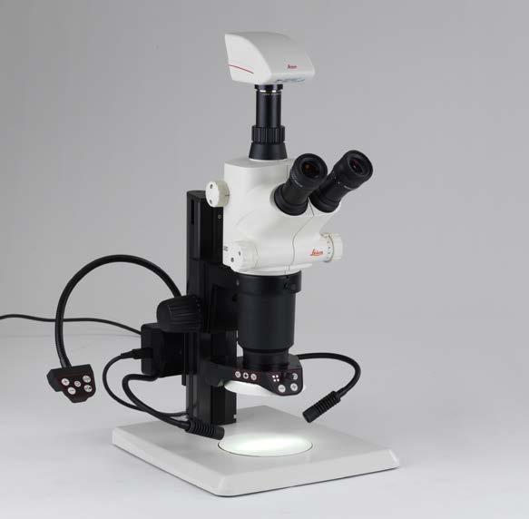 An overview of an S series stereomicroscope 1 Magnification changer, right drive knob with magnification scale 2 S6/S8 models: Stop for zoom limit 3 Focusing drive 4 Fixing screw for optics carrier