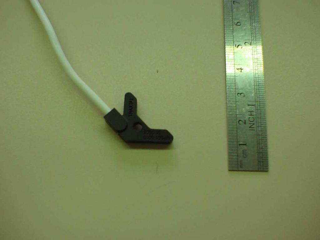 The tool is factory calibrated so that the tracked position is at the edge of the tip. 3. The reference tool (Traxtal Inc. Figure 3.4c), is a small six dof tool.