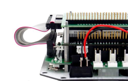 6 round spacers on the four corners of the board, use a 50-pin cable such as DSC #6981063 to route the signals from the 50-pin I/O connector on the Diamond MM board to connector J31 on the panel