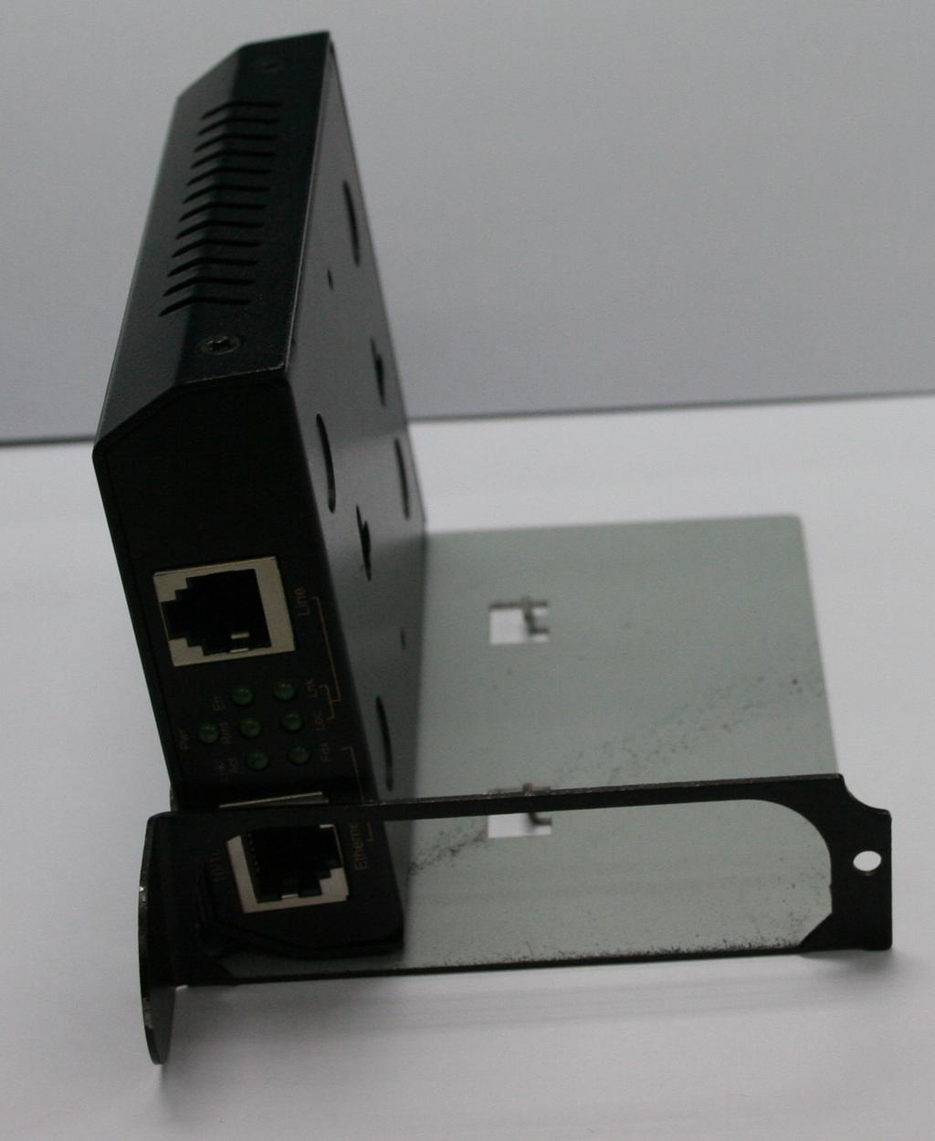 First, install the Ethernet Extender onto a carrier supplied with the chassis:
