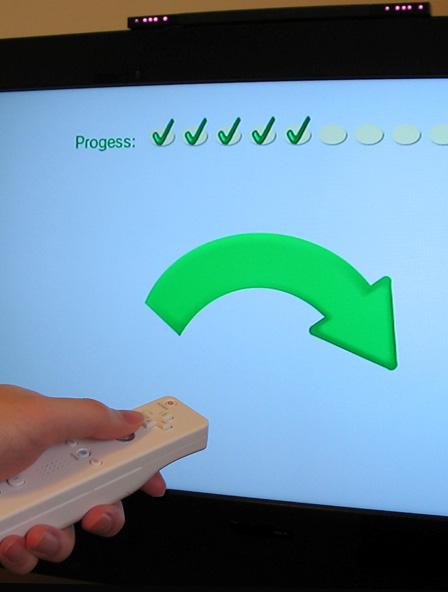 5 Figure 5. The study's data gathering page. An individual is rolling the Wiimote to the right, as prompted on-screen.