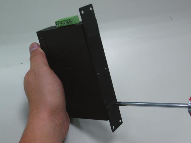 3.2 Wall-mount Plate Mounting To install the Industrial PoE+ Switch on the wall, please follow the instructions described below.