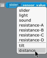 At the bottom of the Scratch category, locate the sensor value block: Step 2: Choose distance from the pull-down menu.