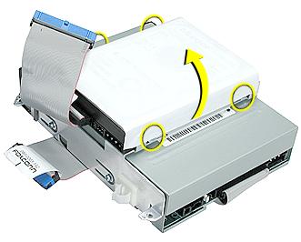 6. To remove the hard drive from the carrier, peel the white wrapper up to access the screws (two on each side).