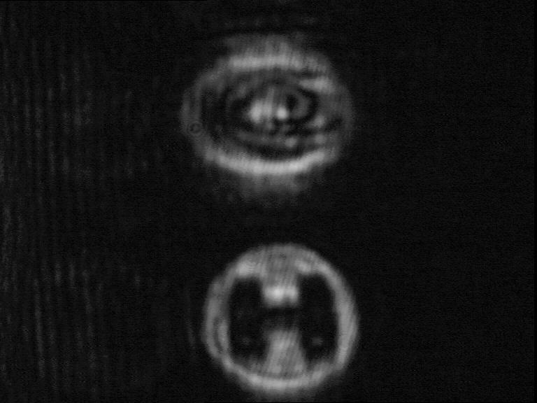 lens between the hologram and the observer are shown in Fig.