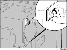 You must attach the hook to a place that will not affect operation of the printer.