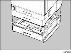Installing Options D Adjust the four corners of the printer to those of the 500-sheet paper feed unit, and then lower the printer slowly into place. E Open the tray of the 500-sheet paper feed unit.