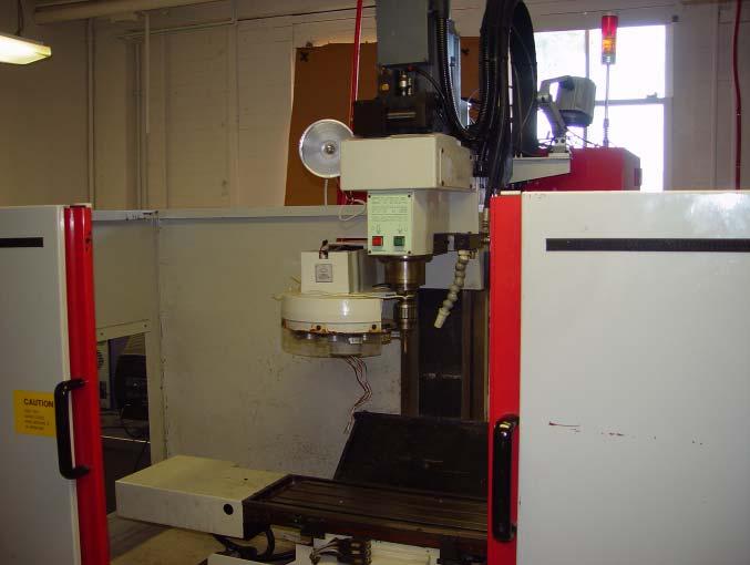 Figure 1: Three Axis Machining Center with Open Controller in the Manufacturing Automation and Control Laboratory at Missouri S&T.