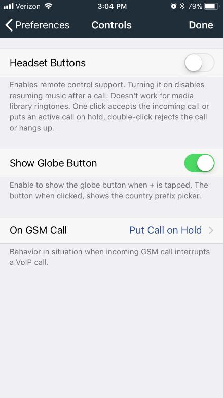 By enabling the Show Globe Button option, when the + is tapped on the dial