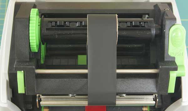 Reduced Wastage The core adaptors used in the Express Printer (pictured below) allow greater flexibility and efficiencies than other ribbon printers 1) The Express Printer can accept any width foil