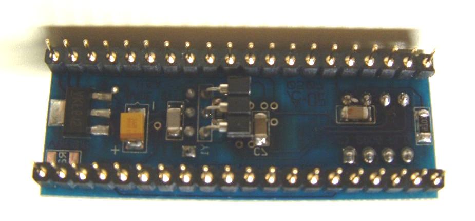 Components installed on the bottom side of the PCB: Install the 5V (or 3.3v) ST-223 Voltage regulator at location U4. The large single tab goes toward the left near the edge of the board.