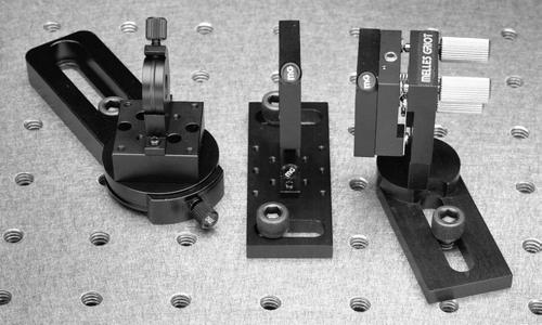 Slotted Mounting Base with Rotation This slotted mounting base, with an integral rotation platform, can be used to position and orient a component anywhere on a ¼-- or M6-threaded table or breadboard.