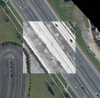 Figure 7. Observed changes between the RC-0 (foreground) and SONY-F77 (background) orthophotos (Note that the road has been widened in the SONY ortho-photo). REFERENCES Baltsavias, E., 999.