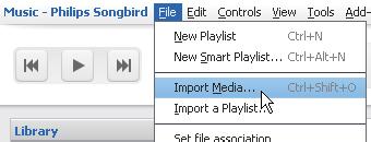 In Philips Songbird, go to File > Import Media to select folders on the PC.» Library.