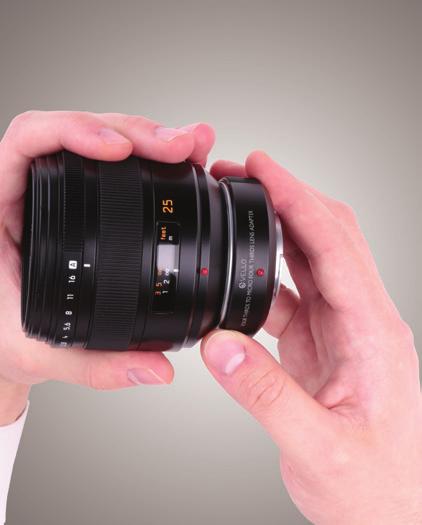 5. Slowly and carefully insert the lens into the adapter