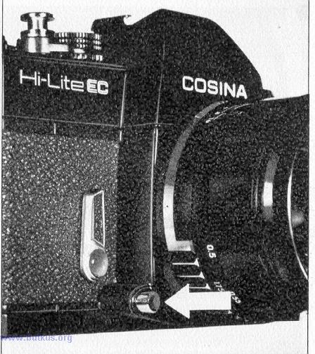 Aperture Release Button The Cosina Hi-Lite EC is so designed that when the shutter button has been depressed one step, the lens is stopped down and a further depression of