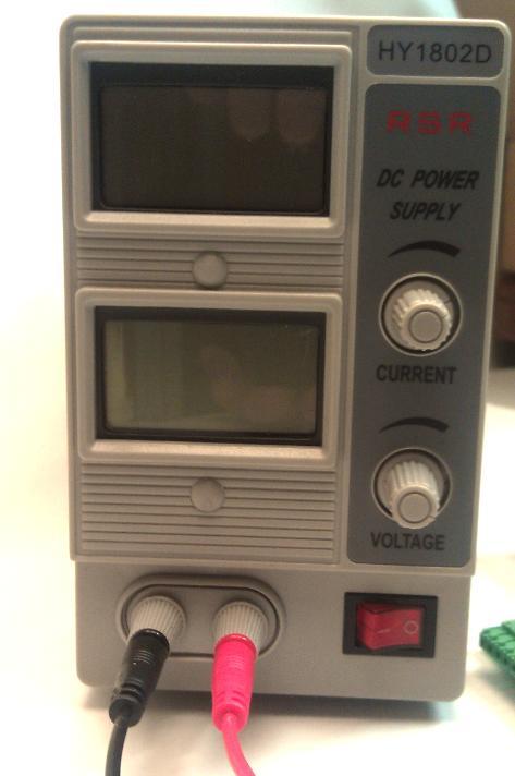 bench DC power supply as shown below. The alternate power supply connections are labeled GND and SV+.