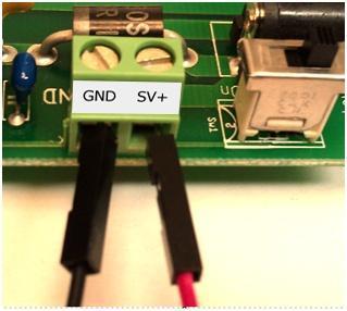 closest terminal to the switch, while the GND terminal is connected to the Ground (black) terminal of the power