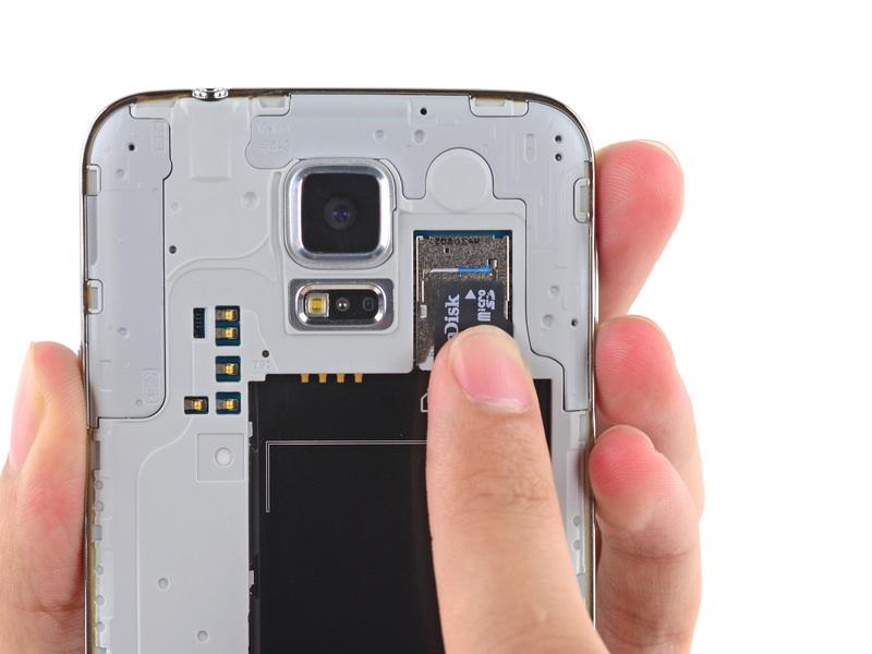 Step 3 microsd Card Using a fingertip, pull the microsd card straight down out of its slot.