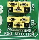 See Figure 11. Another group uses SPI communication lines for programming: MOSI (PB2 pin), MISO (PB3 pin) and SCK (PB1pin).