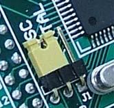 By means of jumper J1 (placed on MCU Card) it is possible to choose clock source to drive
