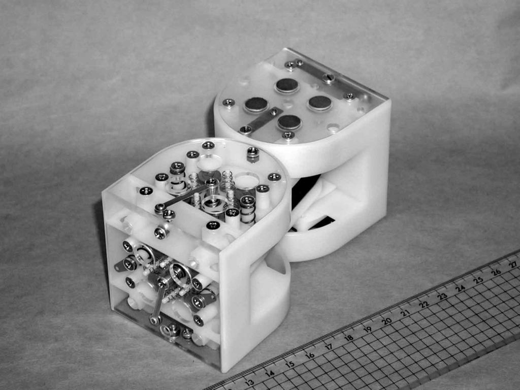 Fig. 2 Prototype module Each box-part has three flat surfaces, called connection surfaces hereafter. Each connection surface can be connected to that of another module.