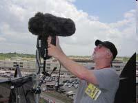 (skateboarding, motorcycle racing) carried on major cable network NASCAR race (with pit crew radios) using