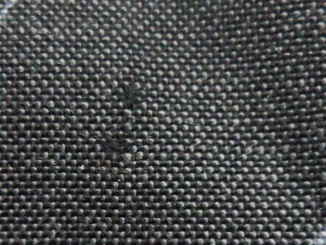 Example 6 Segment the defects The defects appear as dark patches in the cloth. Simply thresholding the image will not segment the defects, since the normal texture of the cloth also has dark pixels.