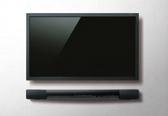 of a TV. If you would like the Soundbar to straddle the TV stand, you can attach the stand to the Soundbar.