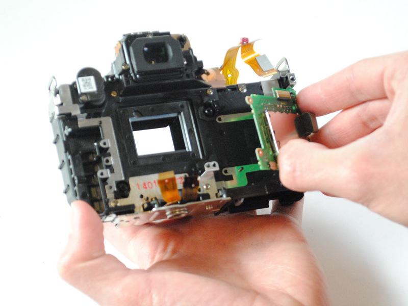 Step 23 Using your fingers, remove the SD card reader from the