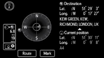 The screen returns to the dual map screen. Information about the destination and current position, as well as a compass, is displayed on the screen.