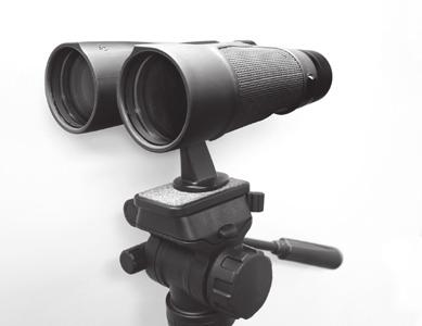Attach the binocular tripod adapter into the threaded hole in the binocular turning it