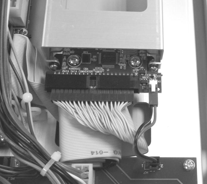 17. Connect the IDE data cable and the power cable to the SATA/PATA Converter board. Hard Drive Install 18.