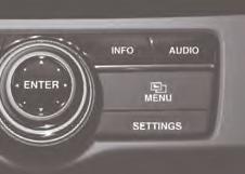 Press the hard button on the system control panel. Select the menu option with the Interface Dial.