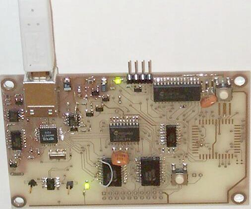 Fig. 2 The download microcontroller serves two purposes: the reset function and the firmware download process.