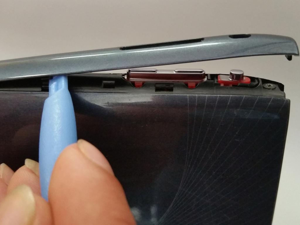 Step 1 Battery Start at any side of the tablet.