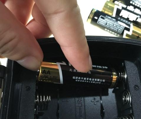 Step 5 - Install the batteries carefully and follow the (-)/(+) symbol, (picture shown) Place