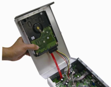 5. Hold the cover and connect the power cable