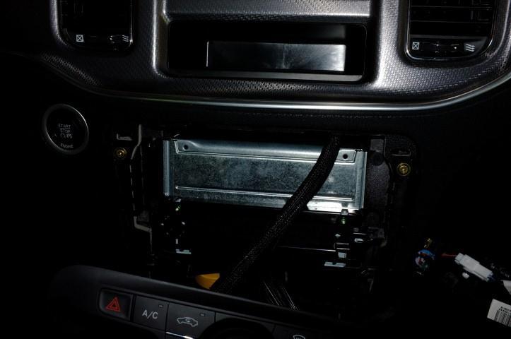 15) Refit the heater control panel as shown For more information,