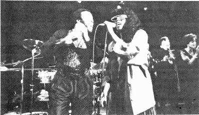 lack An Inspired Summer. Donna Summer joins Andrae Crouch during his performance at the Christian Broadcast Network's annual luncheon at the Century Plaza Hotel in Los Angeles.